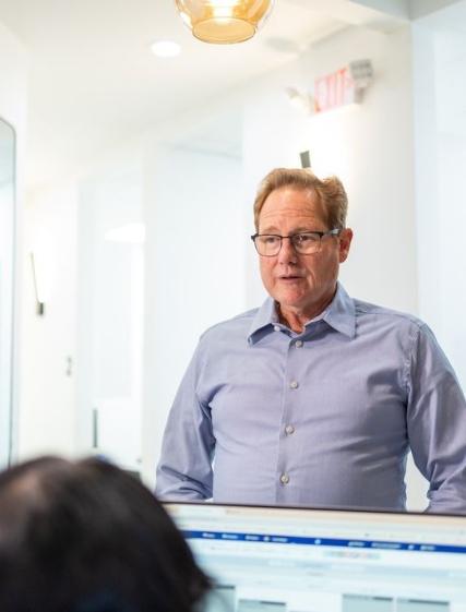 Smiling woman receiving dental treatment