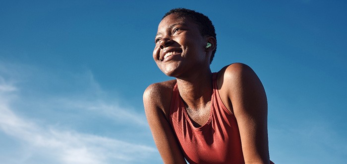 Lady smiles outdoors