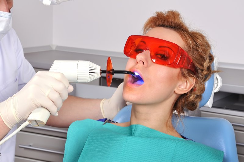 A woman getting a dental bonding treatment